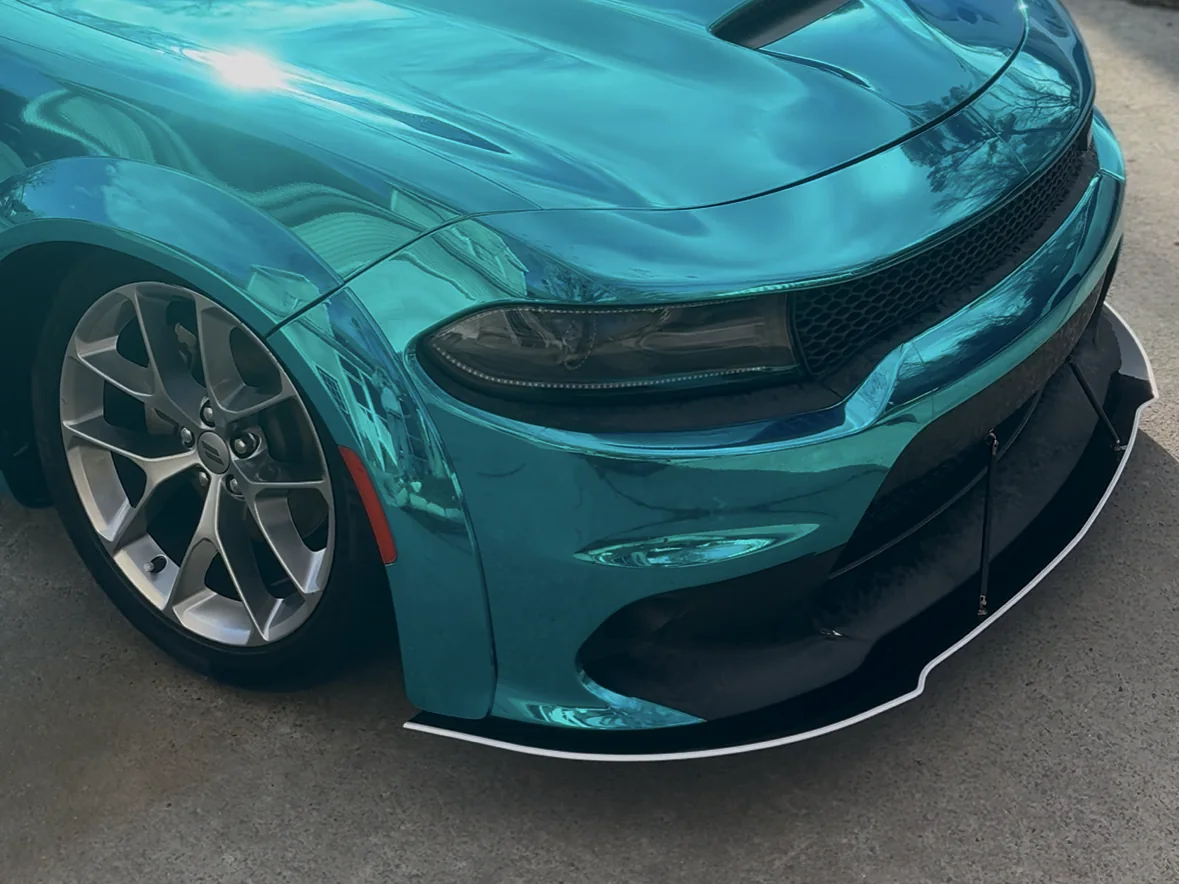 Glossy teal Dodge Charger after an exterior detail