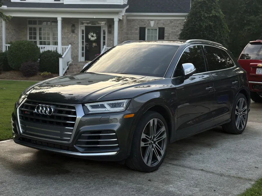 A freshly detailed Audi parked in a driveway